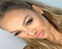 She has piercing on her lips.